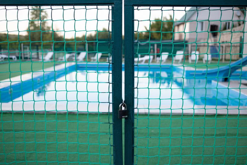 Mesh Fence Secured at Pool Edge